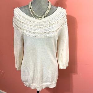 Eva Mendes pearl styled sweater